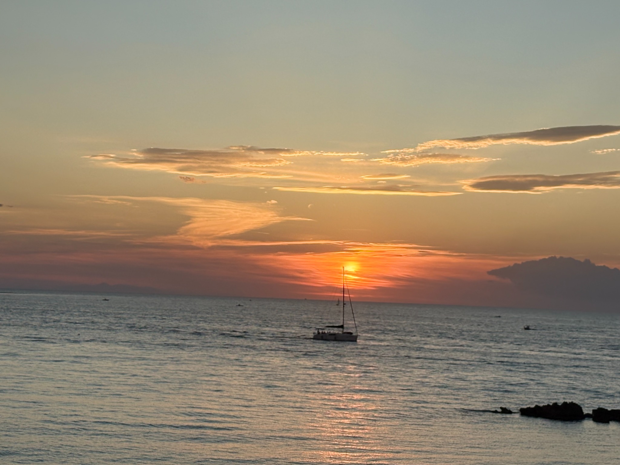 Sunset over the ocean representing reflection and perspective
